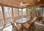 Screened porch on main level open on 3 sides, outdoor dining for 6